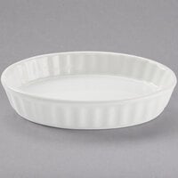 Tuxton BWK-0502 5 oz. White Oval Fluted China Souffle / Creme Brulee Dish - 12/Case