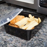 Pactiv Newspring NC636B 36 oz. Black 6 3/4 inch x 6 3/4 inch x 2 5/8 inch VERSAtainer Square Microwavable Container with Lid - 150/Case