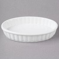Acopa 6 oz. Oval Bright White Fluted Porcelain Souffle / Creme Brulee Dish - 12/Pack