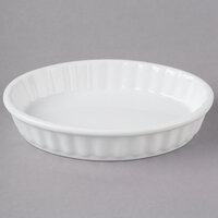 Acopa 5 oz. Oval Bright White Fluted Porcelain Souffle / Creme Brulee Dish - 36/Case