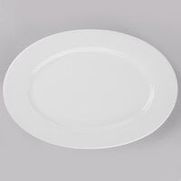 World Tableware 840-520R-15 Porcelana 15 1/2 inch x 10 1/2 inch Oval Bright White Wide Rim Porcelain Platter - 6/Case