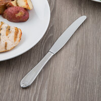 World Tableware 239 5502 Antique 9 1/2 inch 18/0 Stainless Steel Heavy Weight Fluted Solid Handle Dinner Knife - 36/Case