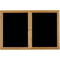 Aarco Enclosed Hinged Locking 2 Door Black Felt Message Board with Natural Oak Frame