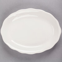 Choice 9 5/8" x 7 1/8" Ivory (American White) Scalloped Edge Oval Stoneware Platter - 24/Case