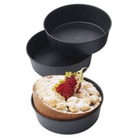 Matfer Bourgeat 345201 Exoglass 4" x 1 1/4" Non-Stick Plain-Edge Tartlet / Mini Cake Pan - 12/Pack