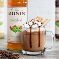 Monin 750 mL Zero Calorie Natural Hazelnut Flavoring Syrup