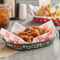 Choice 11 inch x 7 inch x 1 1/2 inch Forest Green Oval Plastic Fast Food Basket - 12/Pack