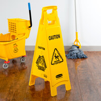 Rubbermaid FG611400YEL 37 inch Yellow 4-Sided Multi-Lingual Wet Floor Sign - Caution
