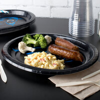 Creative Converting 322418 Carolina Panthers 10 inch x 12 inch Oval Paper Platter - 96/Case