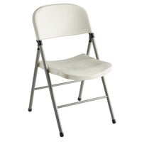 Lancaster Table & Seating Almond Contoured Injection Molded Folding Chair with Charcoal Frame