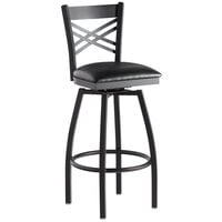 Black metal bar stool with a window style back