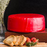 York Valley Cheese Company Druck's 12 lb. Mini Wheel of Yellow Extra Sharp Cheddar Cheese in Red Wax