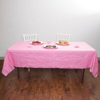 Creative Converting 711344 54 inch x 108 inch Candy Pink Tissue / Poly Table Cover