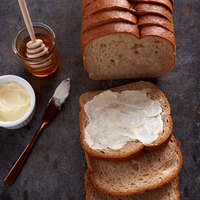 Bakery de France 5/8 inch Sliced Rustic Honey Wheat Bread Loaf - 6/Case