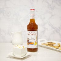Monin 750 mL Premium Brown Butter Toffee Flavoring Syrup