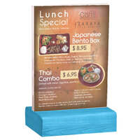 Menu Solutions WBCL-E 5 1/2" x 8 1/2" Clear Acrylic Table Tent with Solid Sky Blue Wood Base