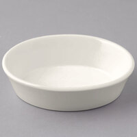 Tuxton BEK-060 7 oz. Eggshell Oval China Baker Dish / Bowl - 12/Case