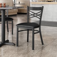 Lancaster Table & Seating Black Finish Cross Back Chair with 2 1/2 inch Black Vinyl Padded Seat - Detached