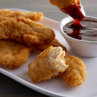 Tyson 5 lb. Uncooked Steakhouse Breaded Chicken Breast Tenders - 2/Case