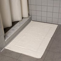 Oxford Vicenza Avorio 21 inch x 36 inch 100% Ringspun Combed Cotton Bath Mat with Dobby Border 12 lb. - 12/Pack