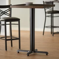 Lancaster Table & Seating 22 inch x 30 inch Black 4 1/2 inch Bar Height Column Cast Iron Table Base with FLAT Tech Equalizer Table Levelers