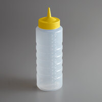 Vollrath 4932-1308 Traex® Color-Mate™ 32 oz. Clear Single Tip Ridged Standard Squeeze Bottle with Yellow Cap