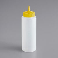 Vollrath 4932-1308 Traex® Color-Mate™ 32 oz. Clear Single Tip Ridged Standard Squeeze Bottle with Yellow Cap