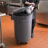 Lavex Janitorial 44 Gallon Gray Round Commercial Trash Can with Lid and Dolly