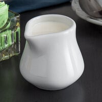 Tuxton BPR-0352 3.5 oz. Porcelain White China Creamer - 12/Case