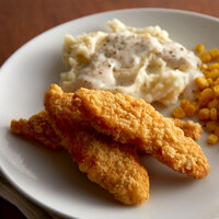 Tyson 5 lb. Bag of Uncooked Homestyle Chicken Breast Tenderloin Fritters - 2/Case