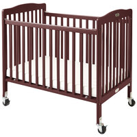 L.A. Baby CW-883A The Little Wood Crib 24 inch x 38 inch Cherry Mini / Portable Folding Wood Crib with 3 inch Vinyl Covered Mattress