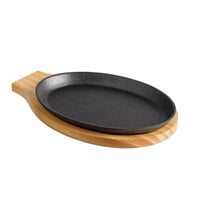 Choice 9 1/4" x 7" Oval Pre-Seasoned Cast Iron Fajita Skillet with Natural Finish Wood Underliner