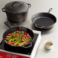 Lodge 4-Piece Pre-Seasoned Cast Iron Cookware Set - Includes 10 1/4 inch Skillet, 10 1/4 inch Grill Pan, and 5 Qt. Dutch Oven