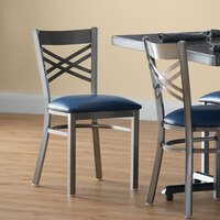 Lancaster Table & Seating Clear Coat Steel Cross Back Chair with 2 1/2 inch Navy Vinyl Seat - Detached Seat