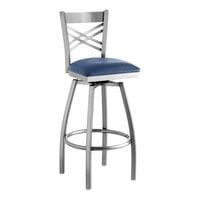 Lancaster Table & Seating Clear Coat Finish Cross Back Swivel Bar Stool with 2 1/2" Navy Vinyl Padded Seat