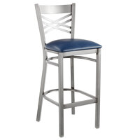 Lancaster Table & Seating Clear Coat Finish Cross Back Bar Stool with 2 1/2" Navy Vinyl Padded Seat