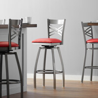 Lancaster Table & Seating Clear Coat Finish Cross Back Swivel Bar Stool with 2 1/2 inch Red Vinyl Padded Seat