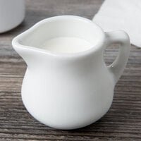 Tuxton BPR-035 3.5 oz. Porcelain White China Creamer - 12/Case