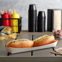 11 inch x 3 3/4 inch x 1 3/8 inch White Paper Hot Dog Tray - 250/Pack