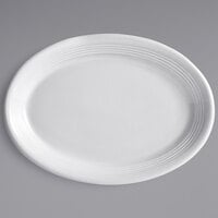 Tuxton CWH-1352 Concentrix 13 1/2 inch x 9 3/4 inch White Oval China Coupe Platter - 6/Case