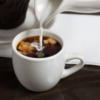 Acopa 3.5 oz. Ivory (American White) Rolled Edge Stoneware Espresso Cup - 36/Case