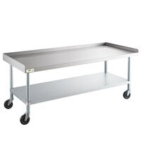 Regency 30 inch x 72 inch 16-Gauge 304 Stainless Steel Equipment Stand with Galvanized Legs, Undershelf, and Casters