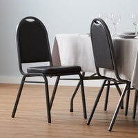Lancaster Table & Seating Black Stackable Banquet Chair with 2 inch Padded Seat and Silver Vein Frame