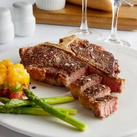 Warrington Farm Meats 16 oz. Frozen Porterhouse Steak - 10/Case