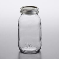 Ball 1440062504 32 oz. Quart Regular Mouth Smooth Sided Glass Canning Jar with Silver Metal Lid and Band - 12/Case