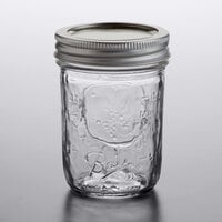 Choice 16 oz. Pint Wide Mouth Canning / Mason Jar with Silver Metal Lid and  Band - 12/Pack