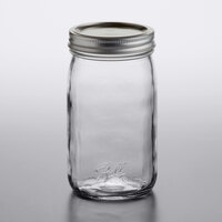 Ball 1440067500 32 oz. Quart Wide Mouth Smooth Sided Glass Canning Jar with Silver Metal Lid and Band - 12/Case