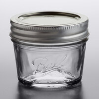 Ball 1440060802 4 oz. Regular Mouth Smooth Sided Glass Canning Jar with Silver Metal Lid and Band - 12/Case