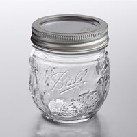Ball 1440081210 8 oz. Half-Pint Elite Regular Mouth Glass Canning Jar with Silver Metal Lid and Band - 4/Pack