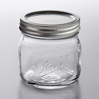 Ball 1440061180 16 oz. Pint Elite Wide Mouth Glass Canning Jar with Silver Metal Lid and Band - 4/Pack